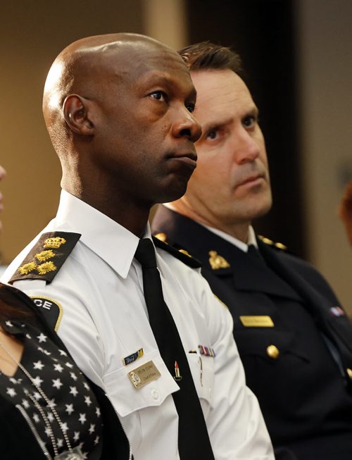 LtoR Wpg Police Chief Devon Clunis  and Assistant Commissioner Kevin Brosseau , sat side by side  during  RCMP releases National Operational Review on Missing and Murdered Aboriginal Women , identifying 1,181 aboriginal  women across Canada since 1980 . May16 2014 / KEN GIGLIOTTI / WINNIPEG FREE PRESS