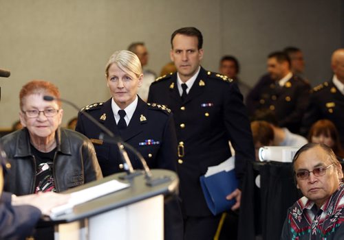 RtoL  Assistant Commissioner Kevin Brosseau , Deputy Commissioner Janice Armstrong , aboriginal Elder Marilee Nault   walking in to release the  report  , also seated far right is Chief Terry Nelson RCMP releases National Operational Review on Missing and Murdered Aboriginal Women , identifying 1,181 aboriginal  women across Canada since 1980 . May16 2014 / KEN GIGLIOTTI / WINNIPEG FREE PRESS