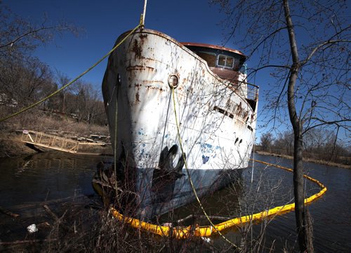 The MS Lord Selkirk sits listing and leaking into the Selkirk Slough. See Alex Paul story re salvage/demolition of the hazardous hulk. May 16, 2014 - (Phil Hossack / Winnipeg Free Press)