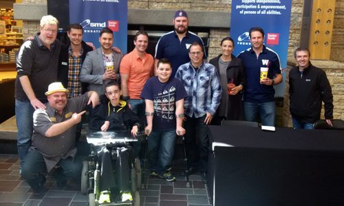 SMD We All Have Ability Day Äì St. Vital Mall The Society for Manitobans with Disabilities (SMD) Foundation/Easter SealsÑ¢ Manitoba and Booster Juice joined together with local media & sports celebrities to showcase the 2nd annual ÄòWe All Have AbilityÄô Day with a smoothie making contest.  Booster Juice locations around Winnipeg donated $1 to SMD Foundation/Easter SealsÑ¢ Manitoba from every smoothie sold on May 9th to support vital programs and services that reach over 47,000 Manitobans with disabilities each year. (Back row L Äì R) Doug Speirs (Winnipeg Free Press), Graham Taylor (Booster Juice), Drew Kozub (City/Breakfast Television), Mike Koncan (Global Television), Paul Swiston (Winnipeg Blue Bombers), Susan Auch Äì Olympian, Mike Renaud (Winnipeg Blue Bombers), Shawn Churchill (CTV)   (Front Row (L Äì R)  Big Daddy Tazz (Comedian/Entertainer), Mitchell Potter (SMD Foundation/Easter SealsÑ¢ Manitoba Ambassador), Spencer Lambert (SMD Foundation/Easter SealsÑ¢ Manitoba Ambassador) & Barry Kay (Cherry Tree Productions)  PHOTO CREDIT SMD FOUNDATION