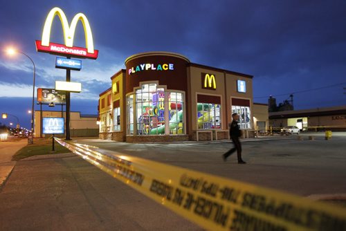 May 4, 2014 - 140518  -  Police investigate a serious assault at a restaurant on Notre Dame Ave Sunday, May 18, 2014. John Woods / Winnipeg Free Press