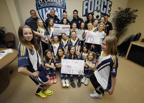 May 19, 2014 - 140519  -  Payton Holland (L) and Emerson Shier and the St Charles Force soccer team practice their curtsies and get prepared for meeting Prince Charles Monday, May 19, 2014. John Woods / Winnipeg Free Press