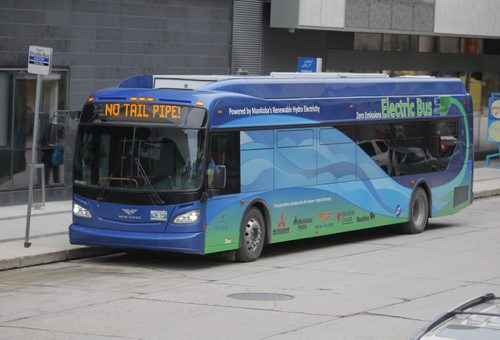 STANDUP - Manitoba Electric Bus. New Flyer's bus is powered by an electric battery. Winnipeg is supposed to  get four of them. This one was parked next to the Manitoba Hydro Building. BORIS MINKEVICH / WINNIPEG FREE PRESS  May 20, 2014