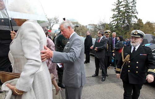 The Prince of Wales guides the The Duchess of Cornwall up the stairs at Government house Tuesday evening greeted by Lt Gov Philip Lee. May 20, 2014 - (Phil Hossack / Winnipeg Free Press)
