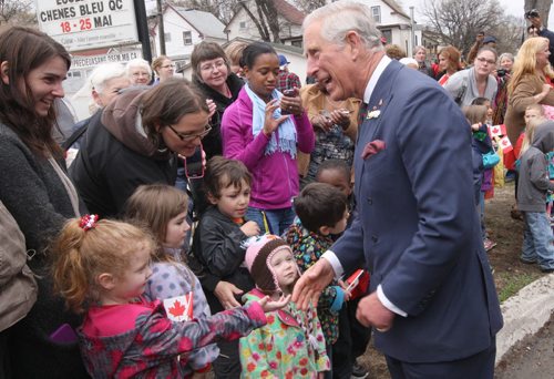 His Royal Highness Prince Charles  works the crowd after visiting Place Bernadette Poirer meeting residents of the assisted living housing unit  - Bruce Owen story- May 21, 2014   (JOE BRYKSA / WINNIPEG FREE PRESS)