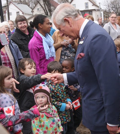 His Royal Highness Prince Charles  works the crowd after visiting Place Bernadette Poirer meeting residents of the assisted living housing unit  - Bruce Owen story- May 21, 2014   (JOE BRYKSA / WINNIPEG FREE PRESS)