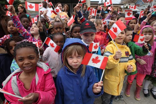 Kids from Ecoleieux-Sang School   wait to get a glimpse of His Royal Highness Prince Charles  as he visits Place Bernadette Poirer meeting residents of the assisted living housing unit  - Bruce Owen story- May 21, 2014   (JOE BRYKSA / WINNIPEG FREE PRESS)