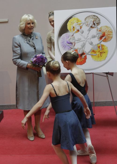 Camilla, Duchess of Cornwall received flowers from young dancers Ava Skromeda, left and Lynea Turner after she helped to unveil the new silver collector coin to commemorate the 75th anniversary of Canada's Royal Winnipeg Ballet. Wednesday morning.   Wayne Glowacki / Winnipeg Free Press May 21 2014