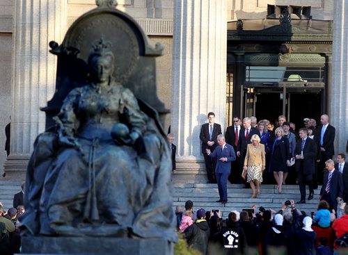 Prince Charles and Camilla leave the Legislature in Winnipeg Wednesday evening for a walkabout and military honors. May 21, 2014 - (Phil Hossack / Winnipeg Free Press)