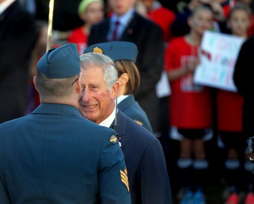 Prince Charles inspects the honor guard and received full military honors before departing Winnipeg Wednesday evening. May 21, 2014 - (Phil Hossack / Winnipeg Free Press)