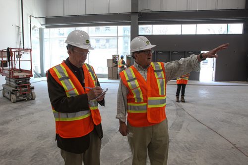 Dr. Lloyd Axworthy on a tour of the University of Winnipeg RecPlex which is still under construction. 140522 - Thursday, May 22, 2014 -  (MIKE DEAL / WINNIPEG FREE PRESS)