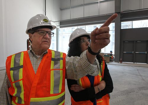 Dr. Lloyd Axworthy and project manager Linda Palmer on a tour of the University of Winnipeg RecPlex which is still under construction. 140522 - Thursday, May 22, 2014 -  (MIKE DEAL / WINNIPEG FREE PRESS)
