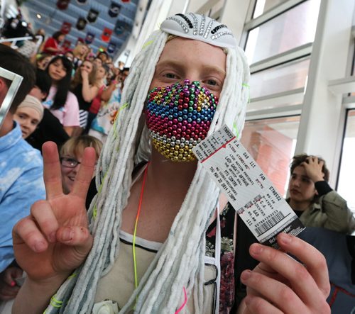Brendin Methot, 17, of Selkirk, waits for the doors to open at the MTS Centre for the Lady Gaga concert on Thurs., May 22, 2014. Photo by Jason Halstead/Winnipeg Free Press