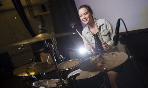 140523 Winnipeg - DAVID LIPNOWSKI / WINNIPEG FREE PRESS (May 23, 2014)  Drummer Jodi Dunlop drums during a sound check with her band, Mis en Scene, Friday afternoon at The West End Cultural Centre.  Her vigorous drumming action is a workout in itself. For Training Basket by Ashley Prest