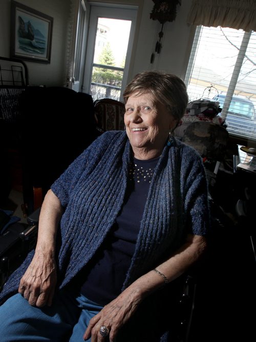 Viola Dufresne grins with satisfaction in her St James retirement home. The 82 year old used her "Granny Cam"  to catch a care worker red handed emtying cash from the purse. See Mike MacIntyre's story. May 23, 2014 - (Phil Hossack / Winnipeg Free Press)