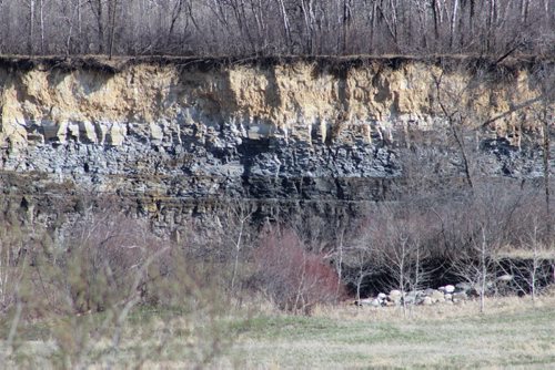 032 - A 20-metre high embankment along the Wilson River, west of Dauphin, near where fossilized bones of a 100 million year old crocodile was found, only the seventh of its species found in North America. BILL REDEKOP/WINNIPEG FREE PRESS May 23,2014