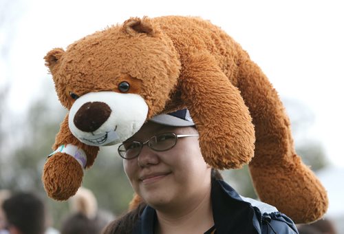 Ruby Thom-Duck, 13, carries her bear on her head at the 28th annual Teddy BearsÄô Picnic at Assiniboine Park on Sun., May 25, 2014. The event is a fundraiser for the ChildrenÄôs Hospital Foundation of Manitoba. Photo by Jason Halstead/Winnipeg Free Press