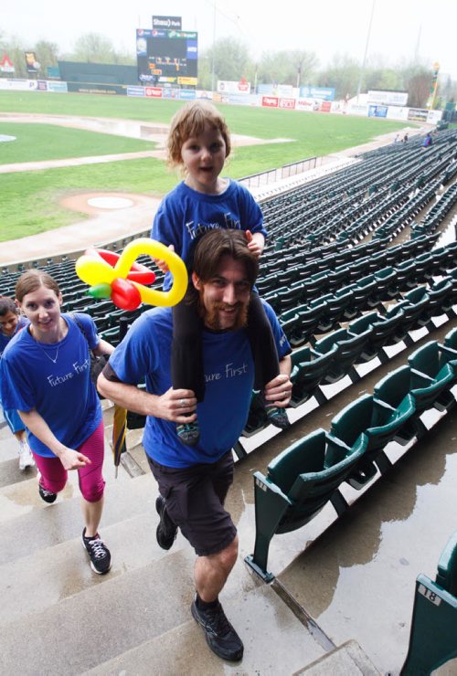 20140525 - Linn and Jeremy Groen and 3 year old daughter Eve run up the steps at Shaw Park as part of the Mammoth Stair Climb put on by Do it for Dads and Step Up Winnipeg. Darcy Finley / Winnipe Free Press