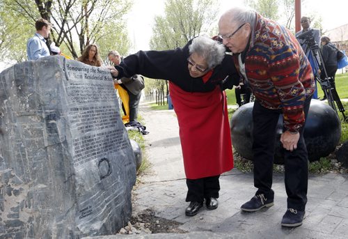 Stdup - FORKS - Residential School survivors Ted Fontaine and Anne Callahan  read the inscription . TRIBUTE HONORS SURVIVORS OF RESIDENTIAL SCHOOLS WINNIPEGÄîThe historic meeting place for Indigenous, M¾©tis and non Indigenous people will take on even greater significance at the Forks, when a monument is unveiled as a tribute to those who attended the Residential Schools in Canada.According to the national Anglican Church website, during the century following Confederation, there were an estimated 80 church run, government funded Indian Residential Schools. The purpose of the schools was to assimilate Indigenous children . in a Canadian apology and the birth of the Truth and Reconciliation Commission in Canada. One of the elders who was a survivor called on the federal government to erect a monument to those who attended Residential Schools .Before his death five years ago, Elder Nelson James from Roseau River suggested such a monument needed to be in a public place where many could see and gain an understanding of the Indigenous Canadians who went to the schools. May 26 2014 / KEN GIGLIOTTI / WINNIPEG FREE PRESS