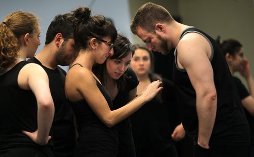 Chai Folk Ensemble dancers check out the next move on a smart phone video during rehearsal at their Notre Dame ave studio. FOR PHOTO PAGE - May 15, 2014 - (Phil Hossack / Winnipeg Free Press)