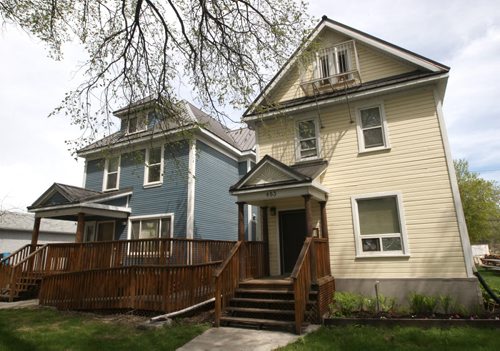 Stephanie and Travis Unger own three rooming houses on Spence St including these two on Spence ST - See Mary Agnes Welch story- May 26, 2014   (JOE BRYKSA / WINNIPEG FREE PRESS)