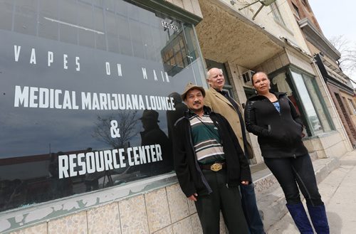 From left, John Tran, Bill VanderGraaf and Lee-Anne Kent outside the Medical Marijuana Lounge and Resource Centre at Vapes on Main on Mon., May 26, 2014. Former police officer VanderGraaf and two partners have opened up a lounge for medical marijuana users at 1402 Main St. RE: Larry Kusch story Photo by Jason Halstead/Winnipeg Free Press