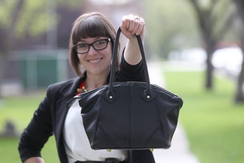 Barbara & Cecile line of purses designed by Monica Jones, 29yrs-Holds one of her creations she personally uses- Connie Tamoto story- May 26, 2014   (JOE BRYKSA / WINNIPEG FREE PRESS)