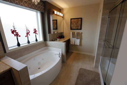 master bath , HOMES  19 Stan Bailie  Drive a Randall Home  in South Pointe . story by Todd Lewys  May 27 2014 / KEN GIGLIOTTI / WINNIPEG FREE PRESS