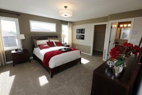 master bedroom - HOMES  19 Stan Bailie  Drive a Randall Home  in South Pointe . story by Todd Lewys  May 27 2014 / KEN GIGLIOTTI / WINNIPEG FREE PRESS