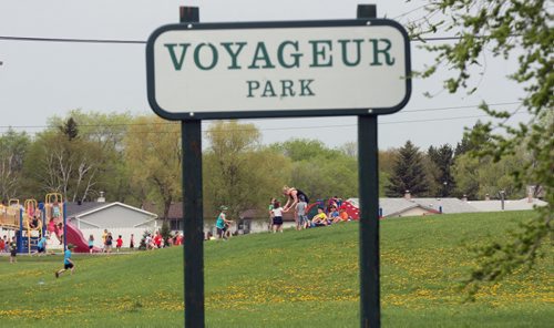 Crestview residents are upset with Coun. Grant Nordmans plans to convert Voyageur Park into an off-leash dog park.  Kids play in park Thursday morning- Aldo Santin story- May 21, 2014   (JOE BRYKSA / WINNIPEG FREE PRESS)