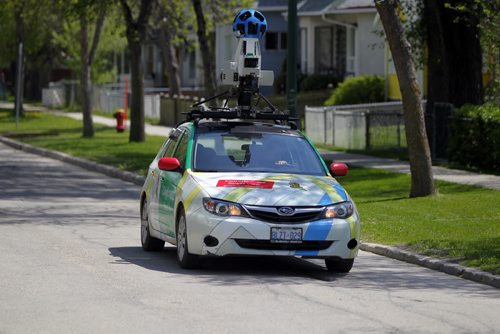 STANDUP - North end photo session. The Google Maps car drives up and down the streets in the north end on a hot Thursday afternoon. The car was seen near Arlington and Stella. BORIS MINKEVICH / WINNIPEG FREE PRESS  May 29, 2014