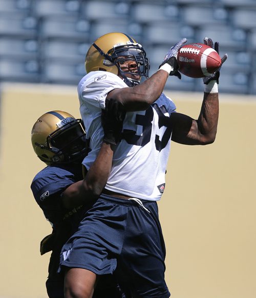 Winnipeg Blue Bombers RB Kevin Smith takes part in football practice at Investors Group Field on Thurs., May 29, 2014. Photo by Jason Halstead/Winnipeg Free Press