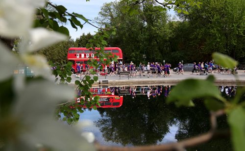 Participants walking in the annual walk for Als, a 5k walk through Assiniboine Park Saturday morning are reflected in the Duck Pond as they walk to raise funds and awareness for the Altzheimer's Society.  Standup Photo.  May 31, 2014 Ruth Bonneville / Winnipeg Free Press