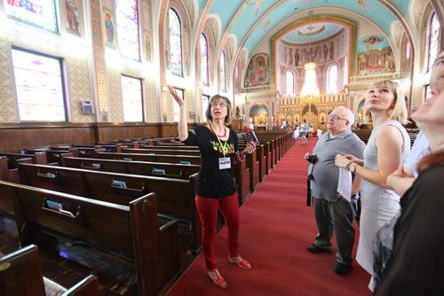 Elaine Kisiow,  volunteer and long time member of Ukrinian Catholic Metropolitan Cathedral of Vladimir and Olga, at 115 McGregor St. points out the majestic features of the church to the public during the  annual Open Doors Winnipeg event Saturday. See story.   May 31, 2014 Ruth Bonneville / Winnipeg Free Press