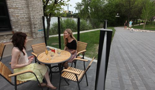 Waterfront Drive.     Photos of new patio and eatery Cibo next to Stephen Juba Park for Feature story on Waterfront Blvd.  People enjoy the outdoor patio at Cibo, a  new eatery right on the waterfront.   May 31, 2014 Ruth Bonneville / Winnipeg Free Press