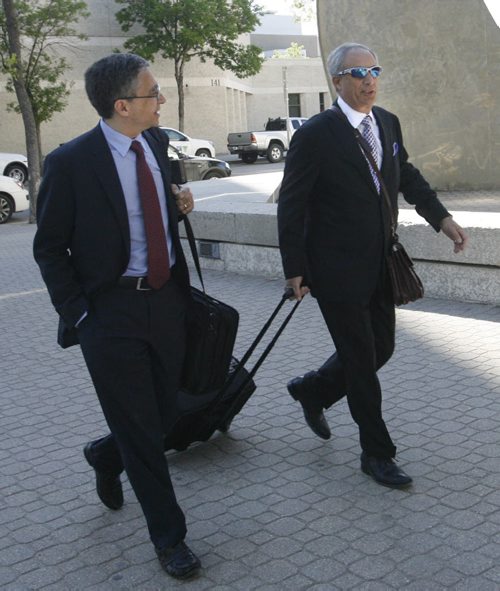 Lawyers Robert Tapper,at right and Jonathan Kroft arrive at the Law Courts Wednesday morning for  the PST court case.  Bruce Owen story Wayne Glowacki / Winnipeg Free Press June 4 2014