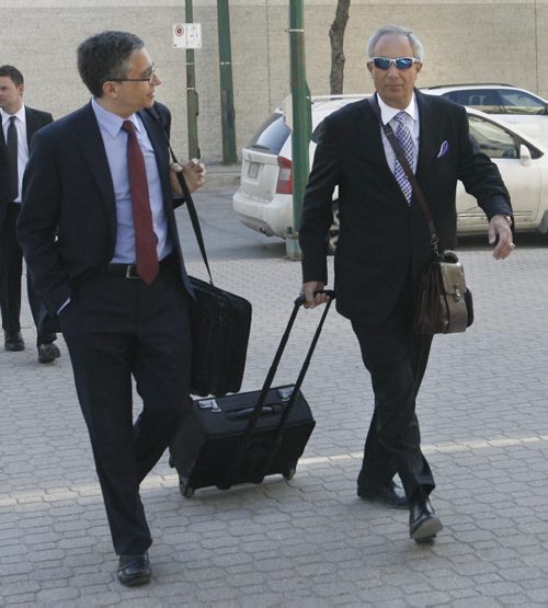 Lawyers Robert Tapper,at right and Jonathan Kroft arrive at the Law Courts Wednesday morning for  the PST court case. Bruce Owen story Wayne Glowacki / Winnipeg Free Press June 4 2014