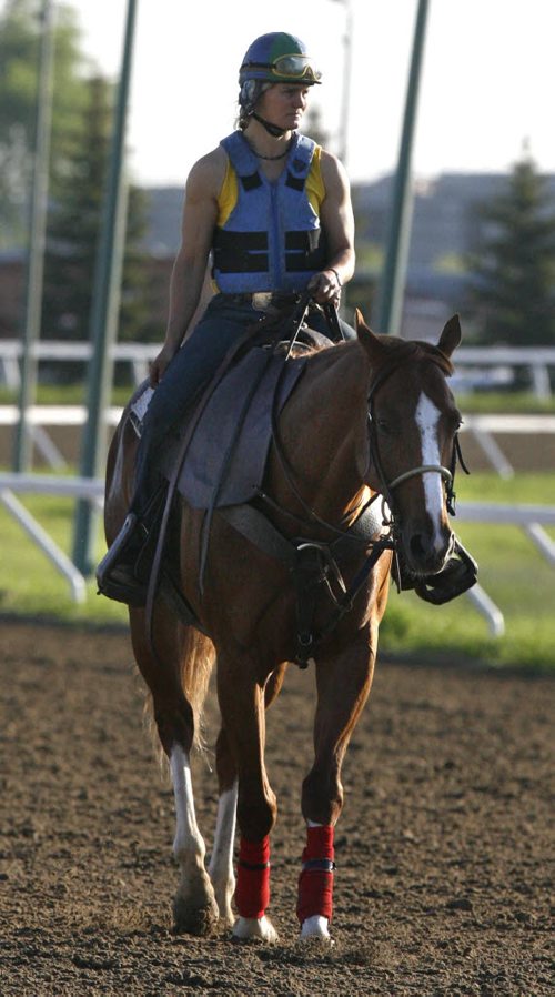 Amber Meyaard, Assistant Trainer on  the track at the Assiniboia Downs Wednesday morning. Story by George Williams / Horse Racing freelancer    Wayne Glowacki / Winnipeg Free Press June 4 2014