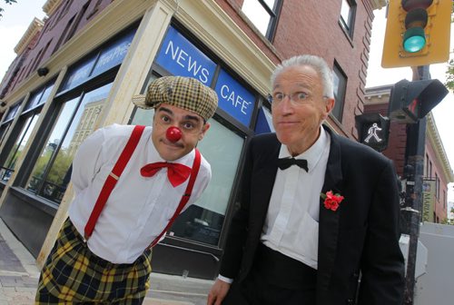 LOCAL-CAFE- KIDS FESTIVAL - Pedro Tochas and Al Simmons pose for a photo in front of the Winnipeg Free Press Cafe. BORIS MINKEVICH / WINNIPEG FREE PRESS  June 5, 2014