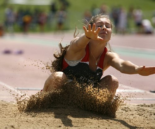 Avery Sims from Kelvin High School competes in a qualifying round of the junior girls long jump event at the 2014 Milk Provincial High School Track & Field Championship at the U of M University Stadium Thursday. The championship runs until  June 7. Thursday. Wayne Glowacki / Winnipeg Free Press June 5 2014