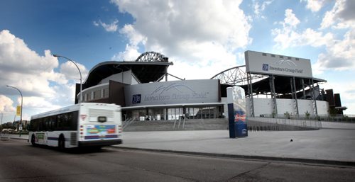 City Buses and stadium.....See story. June 5, 2014 - (Phil Hossack / Winnipeg Free Press)