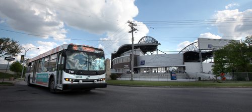 City Buses and stadium.....See story. June 5, 2014 - (Phil Hossack / Winnipeg Free Press)