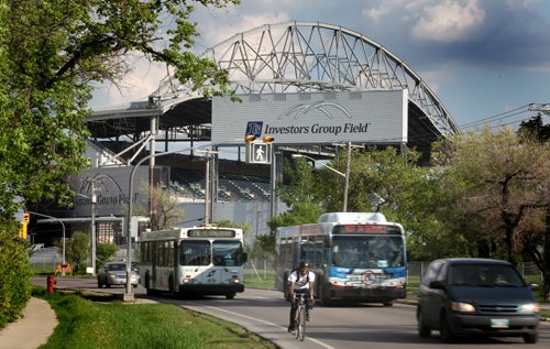 City Buses and stadium.....See story. June 5, 2014 - (Phil Hossack / Winnipeg Free Press)