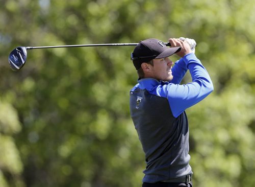 UofM player Josh  Wytinck drives ball on 10th tee , Manitoba  Team wins the team championship  at the 2014 Canadian University /College Golf Championship  at Southwood G&CC final day action June 6 2014 / KEN GIGLIOTTI / WINNIPEG FREE PRESS