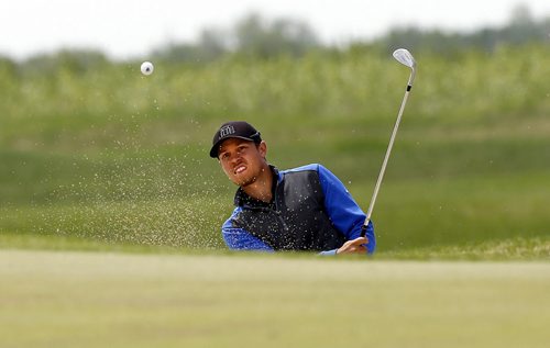 UofM player Josh  Wytinck chip from bunker on 18 , Manitoba  Team wins the team championship  at the 2014 Canadian University /College Golf Championship  at Southwood G&CC final day action  June 6 2014 / KEN GIGLIOTTI / WINNIPEG FREE PRESS