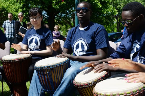 Jeremie Kalimba and other members of the Peaceful Village Drummers played while opening the speeches at the launch of the 2014 youth summer employment programs. Sarah Taylor / Winnipeg Free Press