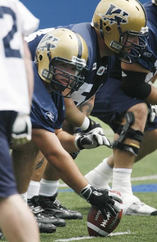 John Woods / Winnipeg Free Press / July 11/07- 070711  - Dominic Picard (53) of the Bombers sets up at practice Wednesday, July 11/07.
