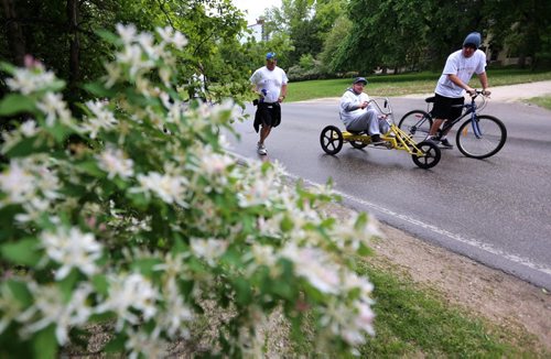 Participants in the Cruising Down the Crescent walkathon to raise money for children with disabilities, Sunday, June 8, 2014. (TREVOR HAGAN/WINNIPEG FREE PRESS)