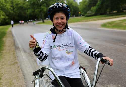 Keera Lyall, 17, participates in the Cruising Down the Crescent walkathon to raise money for children with disabilities, Sunday, June 8, 2014. (TREVOR HAGAN/WINNIPEG FREE PRESS)
