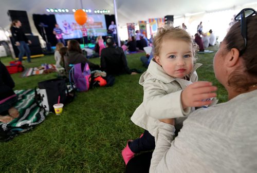 Lyla Nedelec, 19 months, takes in a concert with her mom, Rachel, at Kids Fest at The Forks, Sunday, June 8, 2014. (TREVOR HAGAN/WINNIPEG FREE PRESS)